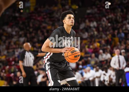 Washington State Cougars guard Isaiah Watts (12) attempts a free throw in the second half of the NCAA basketball game against Arizona State in Tempe, Stock Photo