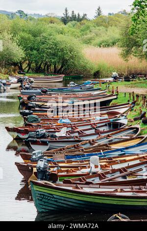 Moored boats on river in Killarney National Park, Ireland. High quality photo Stock Photo