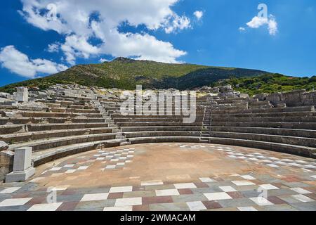 Sunny view of the ancient theatre with a view of the stage and the rows of seats, Asklepios sanctuary, Ekklesiasterion, meeting place of the Stock Photo