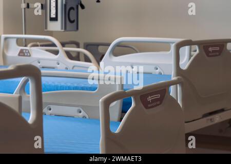 Silent Resilience: Rows of empty hospital beds await the next chapter, a testament to the strength of healthcare systems. Stock Photo