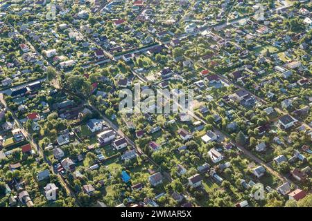 Settlement with houses in a small town, photographed from above. Stock Photo