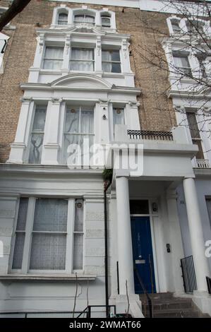 Attractive buildings, Notting Hill, Royal Borough of Kensington and Chelsea; London, UK.  elegant entrance, steps to front door, Stock Photo