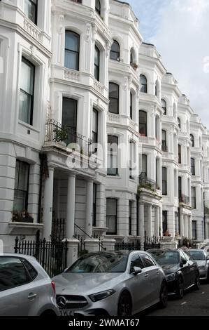 Attractive buildings, Hedgegate Court, Notting Hill, Royal Borough of Kensington and Chelsea, London, UK, Victorian style buildings; white stucco Stock Photo