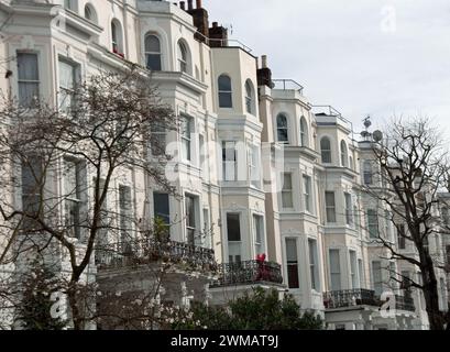 Attractive buildings, Notting Hill, Royal Borough of Kensington and Chelsea; London, UK.  street view; terraced houses; Victorian style; stucco Stock Photo