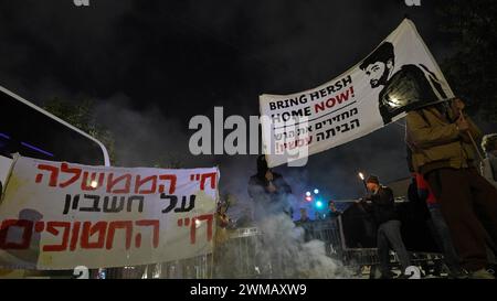 Protesters hold banners during a demonstration near the official Prime Minister's residence demanding the release of hostages held by Hamas in the Gaza Strip on February 19, 2024 in Jerusalem. Israel Stock Photo