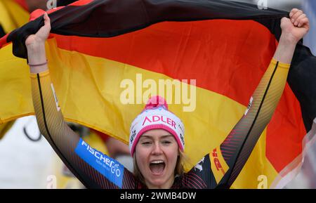 Winterberg, Germany. 25th Feb, 2024. Bobsleigh: World Championships, monobob, women, 4th run. Laura Nolte from Germany celebrates after her victory. Credit: Robert Michael/dpa/Alamy Live News Stock Photo