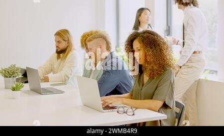 Diverse people working in a coworking space Stock Photo