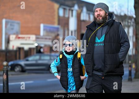 Wolverhampton, UK. 25th Feb, 2024. Fans arriving at the ground during the Premier League match Wolverhampton Wanderers vs Sheffield United at Molineux, Wolverhampton, United Kingdom, 25th February 2024 (Photo by Cody Froggatt/News Images) in Wolverhampton, United Kingdom on 2/25/2024. (Photo by Cody Froggatt/News Images/Sipa USA) Credit: Sipa USA/Alamy Live News Stock Photo