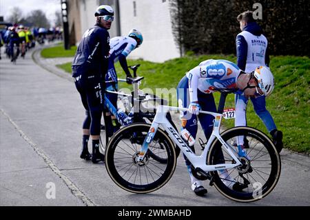 Kortrijk, Belgium. 25th Feb, 2024. Dutch Bram Welten of Team DSM-Firmenich PostNL pictured after a fall during the Kuurne-Brussels-Kuurne one day cycling race, 196, 4 km from Kuurne to Kuurne via Brussels, Sunday 25 February 2024. BELGA PHOTO JASPER JACOBS Credit: Belga News Agency/Alamy Live News Stock Photo