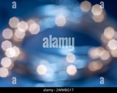 Bokeh, defocused image of burning lights. Abstract Light Background. Stock Photo