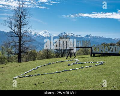 Large wooden letters buliding the words 'Laguna Corazon', parking lot at trail to heart-shaped lake Laguna Corazon, near Liquine, Chile Stock Photo