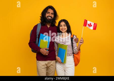 Cheerful indian man and woman choosing education abroad Stock Photo