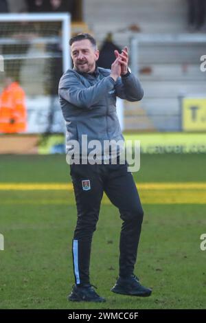 Burton Upon Trent, UK, 24, February, 2024:Northampton Town Manager John Bradey celebrates Northampton Town beating Burton Albion 2-0 in the EFL League One Burton Albion v Northampton Town Credit: Clive Stapleton/Alamy Live News Stock Photo