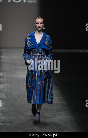 Milan, Italy. 25th Feb, 2024. Women's Fashion, Autumn Winter 2025. HUI fashion show catwalk Pictured:Model Credit: Independent Photo Agency/Alamy Live News Stock Photo