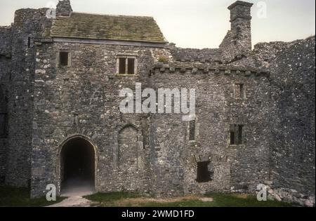 1987 archive photograph of Weobley Castle, a 14th-century fortified manor house on the Gower Peninsula in Wales. Stock Photo
