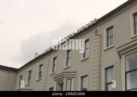 Dublin, Ireland - Februar 24th 2024: A photo of the Haddington Hotel building exterior in Dublin against a cloudy sky. Stock Photo