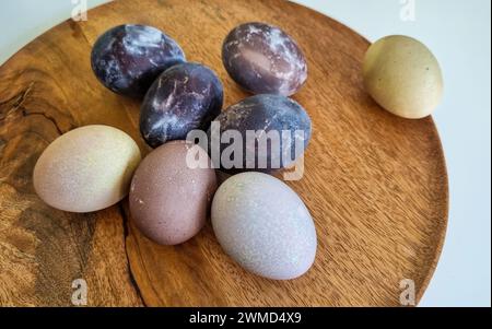 Naturally dyed Easter eggs in red wine Stock Photo