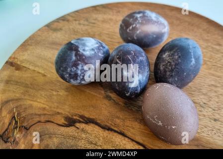 Naturally dyed Easter eggs in red wine Stock Photo