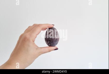 Naturally dyed Easter eggs in red wine Stock Photo