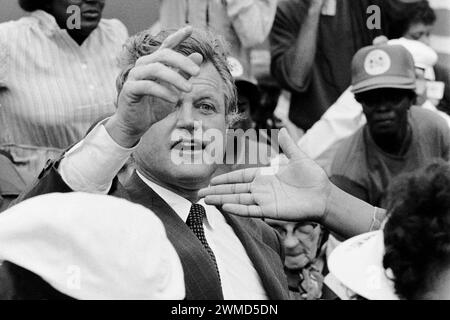 Washington, United States. 19 September, 1981. U.S Senator and Democratic presidential candidate Ted Kennedy, D-MA, reaches out to greet union members and civil rights activists during the Solidarity Day march, September 19, 1981 in Washington D.C. The march organized by the United Mine Workers, AFSCME, UAW, NOW, NAACP, AFL-CIO, and the National Urban League is in protest to the policies of President Ronald Reagan. Stock Photo