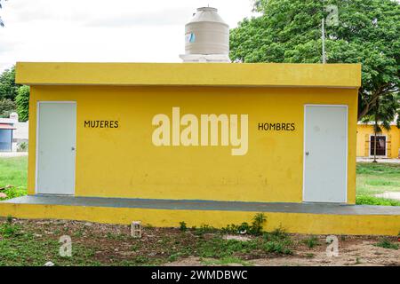 Merida Mexico,Yaxcopoil,Parque principal de Yaxcopoil main public park,men's women's restroom bathroom,abandoned vacant outside exterior,building fron Stock Photo