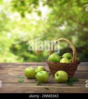 Fragrant apples in a basket on a blurred natural background. A warm summer day and a basket of apples in the sun on a wooden background. Harvest. Deli Stock Photo