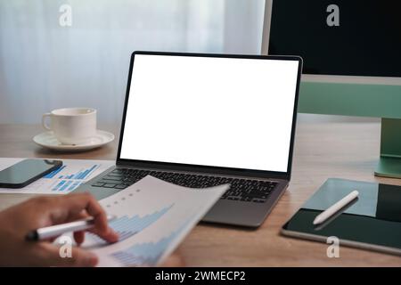 man business analytics working Businessman using a desktop computer of the blank screen Stock Photo
