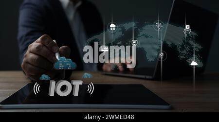 Internet of Things (IOT) Smart Businessman touching virtual screen Internet business Stock Photo