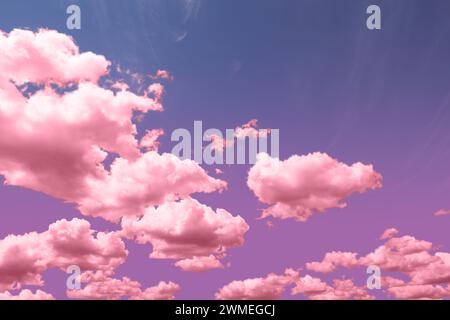 Pink fluffy clouds floating in beautiful sky Stock Photo