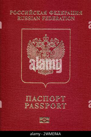 Cover of the international passport of the Russian Federation with the coat of arms in the form of a double-headed eagle: February 26, 2024 - Russia Stock Photo