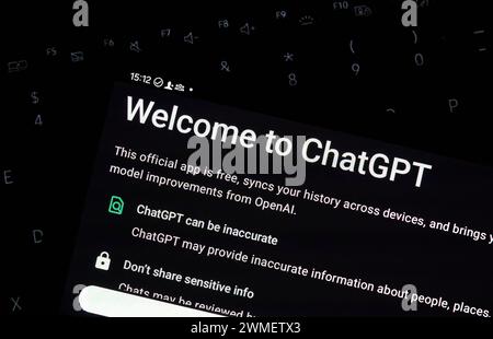 Dallas, TX USA - February 24, 2024: Welcome page of ChatGPT bot on android cellphone on a keyboard. OpenAI's ChatGPT, lets users guide conversations u Stock Photo