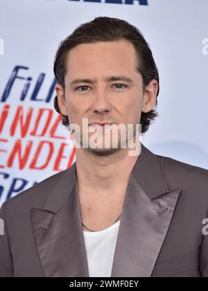 Lewis Pullman arriving to the 2024 Film Independent Spirit Awards at