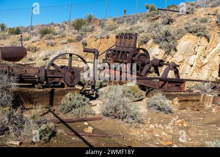 Famous Lost Horse Gold and Silver Mine Platform, Rust Colored Industrial Machine Equipment Junkyard. Joshua Tree National Park California Southwest US Stock Photo