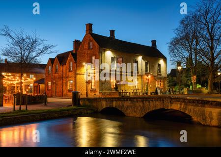 The Kingsbridge Inn at dusk. Bourton on the Water, Cotswolds, Gloucestershire, England Stock Photo