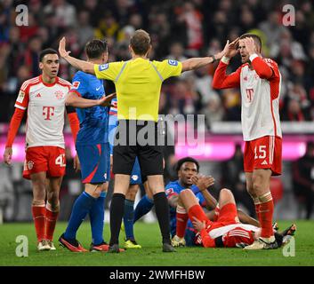 Controversial decision by referee Sascha Stegemann after tackle, action Lois Openda RasenBallsport Leipzig RBL (17) against Raphael Guerreiro FC Stock Photo