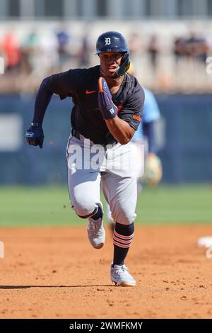 Port Charlotte, FL: Detroit Tigers shortstop Eddys Leonard (51) runs safely to third on the double play ball hit by designated hitter Donny Sands (72) Stock Photo
