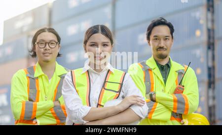 A group of dock workers posing confidently for the camera. Thailand, Bangkok Stock Photo