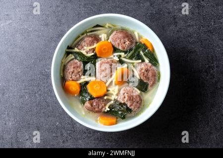Italian Wedding Soup with meatballs and spinach Stock Photo