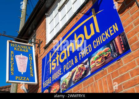 Istanbul kebab burgers pizza chicken, take-away restaurant signs, Halesworth, Suffolk, England, UK Stock Photo