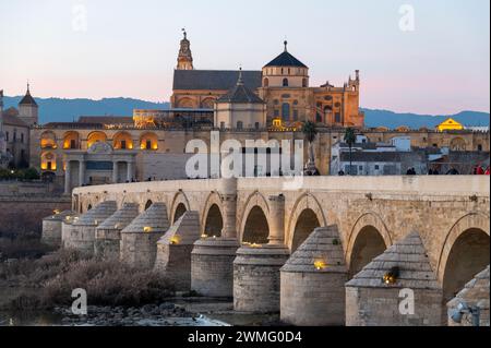 The Roman Bridge of Cordoba is a long-restored pedestrian-free bridge with arches originally constructed in the early 1st century BCE, across the Guad Stock Photo