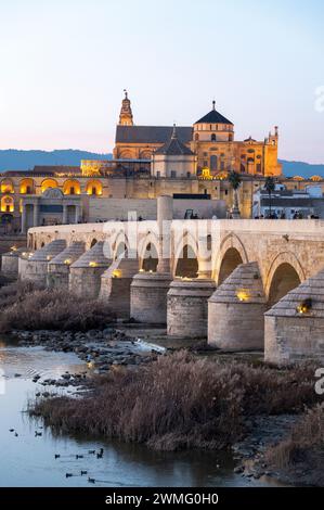 The Roman Bridge of Cordoba is a long-restored pedestrian-free bridge with arches originally constructed in the early 1st century BCE, across the Guad Stock Photo