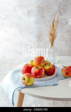 ripe red apples on the table Stock Photo
