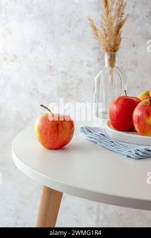 ripe red apples on the table Stock Photo