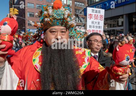 February 25, 2024, New York, New York, United States: (NEW) Chinatown Lunar New Year Parade. February 25, 2024, New York, New York, USA: People wearing different costumes participate in the annual Lunar New Year parade in Chinatown on February 25, 2024 in New York City. People gathered to enjoy and celebrate the 26th annual Lunar New Year parade, commemorating the end of the 15 days honoring the first new moon on the lunar calendar. 2024 is the &quot;Year of the Dragon.&quot; (Credit Image: © Ron Adar/TheNEWS2 via ZUMA Press Wire) EDITORIAL USAGE ONLY! Not for Commercial USAGE! Stock Photo