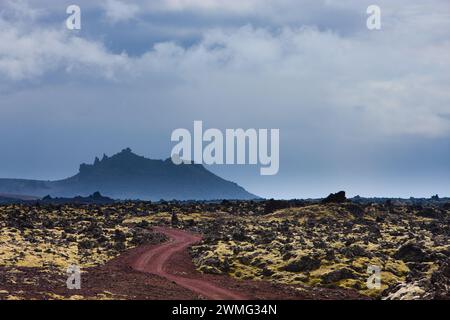A dirt road through a rocky landscape Stock Photo