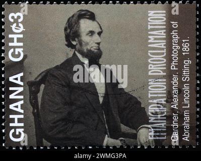 Photograph of Abraham Lincoln sitting on postage stamp Stock Photo