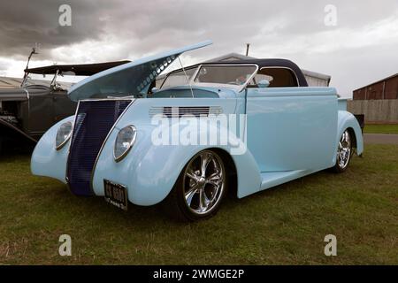 View of a White,  1937 Ford-Based Customized Hot Rod, on display in the Yokahama Shift and Drift Zone, of the 2023 Silverstone Festival Stock Photo