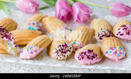 A platter of beautifully decorated French Madeleines for spring and Easter. Stock Photo