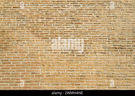 Brick wall texture or background. background is made of thin brown brick. wall Stock Photo