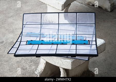 Air conditioner dust filter dismantled, parts cleaned Stock Photo